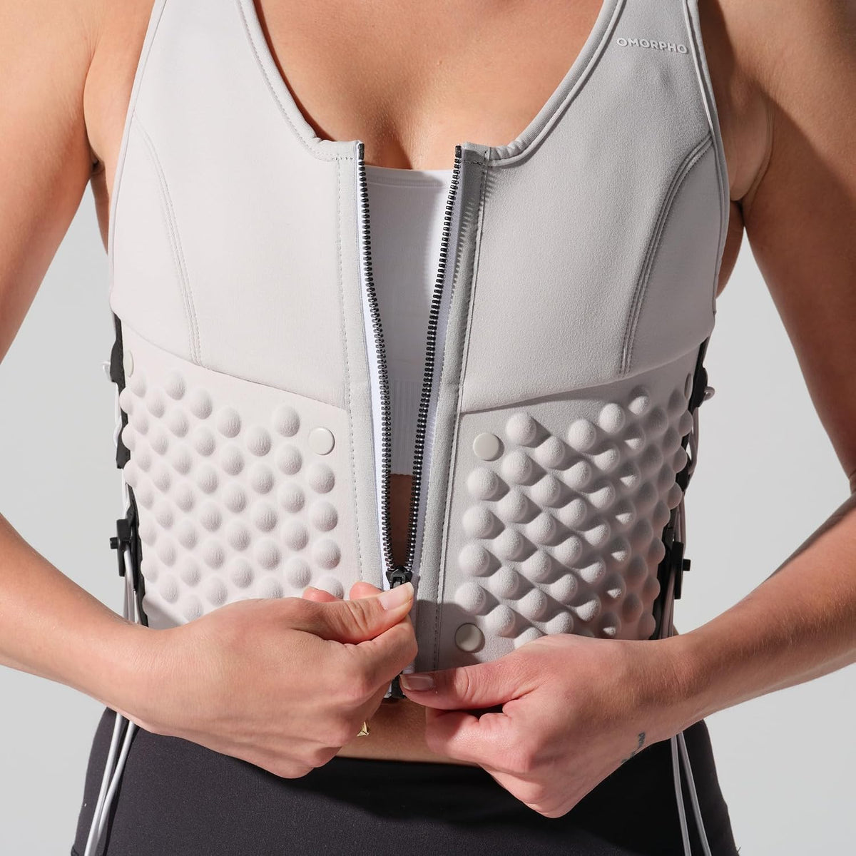 OMORPHO Women’s G-Vest Icon, 6 lb (up to 12 lb with optional G-Pack, sold separately), low-profile, fully adjustable comfort fit for hiking, walking, running, and training.